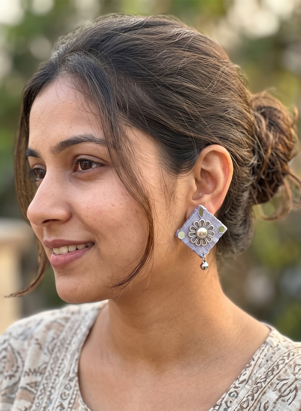 Lavender Handcrafted Diamond Fabric Studs with Oxidized Floral Medallion, Shisha Mirror Accents & Ghungroo Drop