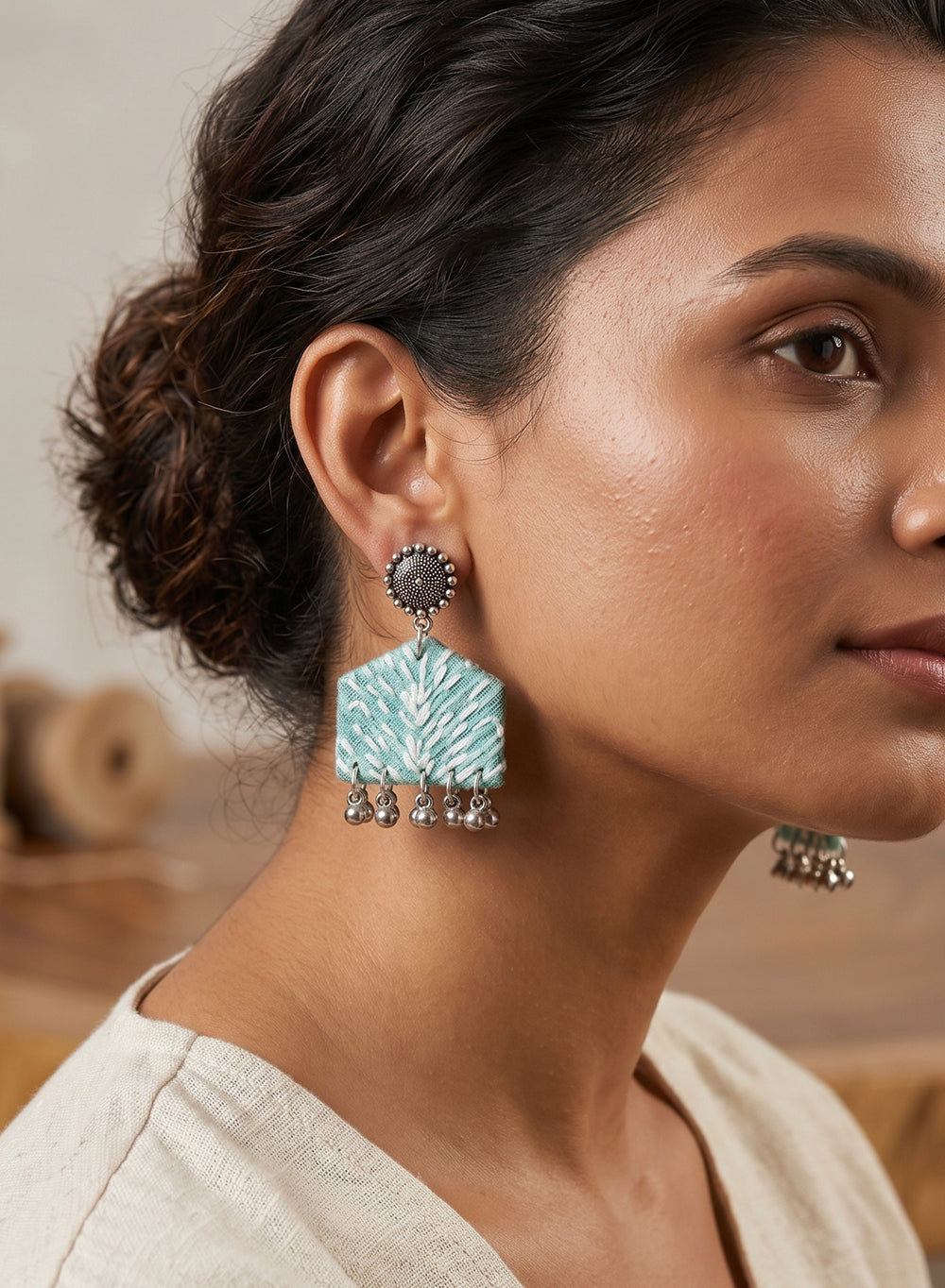 Sea-Green Handcrafted Peaked Fabric Drop Earrings with Oxidized Stud Tops & Ghungroo Clusters